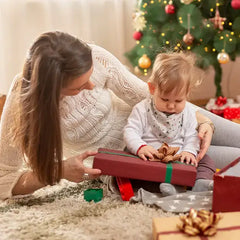 Mum and daughter are unboxing gift boxes.