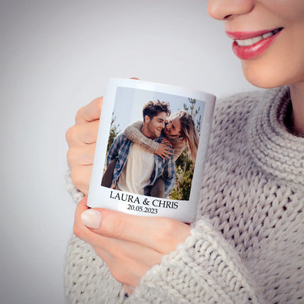 Custom photo coffee mug held by a woman, featuring text and image ideal for special occasions.